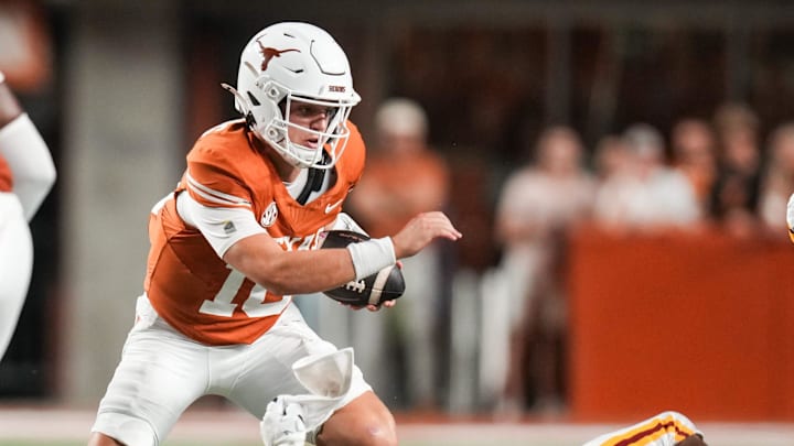 Texas Longhorns quarterback Arch Manning (16) advances the ball as the Texas Longhorns take on ULM at Darrell K Royal-Texas Memorial Stadium in Austin Saturday, Sept. 21, 2024.