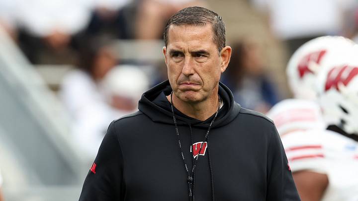 Sep 26, 2026; University Park, Pennsylvania, USA;  Wisconsin Badgers head coach Luke Fickell walks on the field during a warmup prior to the game against the Penn State Nittany Lions at West Shore Home Field at Beaver Stadium.  Mandatory Credit: Matthew O'Haren-Imagn Images