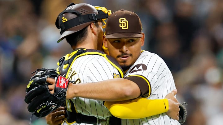 May 28, 2024; San Diego, California, USA; San Diego Padres relief pitcher Jeremiah Estrada (56) celebrates with San Diego Padres catcher Kyle Higashioka (20) after the Padres defeat the Miami Marlins 4-0 at Petco Park. Mandatory Credit: David Frerker-USA TODAY Sports