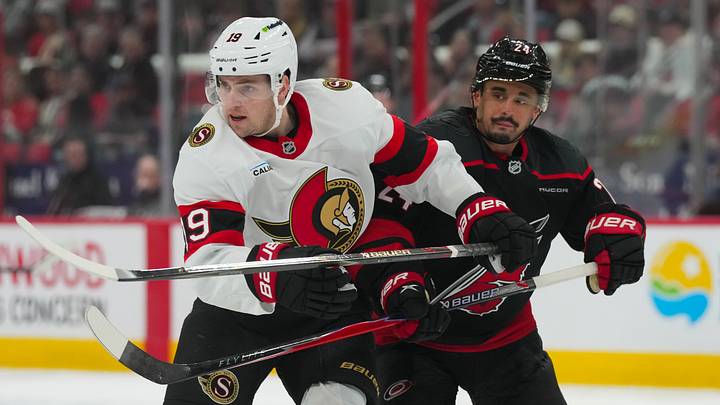 Apr 20, 2026; Raleigh, North Carolina, USA; Carolina Hurricanes center Seth Jarvis (24) and Ottawa Senators right wing Drake Batherson (19) battle in the first overtime period in game two of the first round of the 2026 Stanley Cup Playoffs at Lenovo Center. Mandatory Credit: James Guillory-Imagn Images Apr 20, 2026; Raleigh, North Carolina, USA; Carolina Hurricanes center Seth Jarvis (24) and Ottawa Senators right wing Drake Batherson (19) battle in the first overtime period in game two of the first round of the 2026 Stanley Cup Playoffs at Lenovo Center. Mandatory Credit: James Guillory-Imagn Images