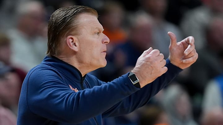 Mar 19, 2026; Greenville, SC, USA; Illinois Fighting Illini head coach Brad Underwood instructs his team against the Penn Quakers in the first half of a first round game of the men's 2026 NCAA Tournament at Bon Secours Wellness Arena. Mandatory Credit: Jim Dedmon-Imagn Images Mar 19, 2026; Greenville, SC, USA; Illinois Fighting Illini head coach Brad Underwood instructs his team against the Penn Quakers in the first half of a first round game of the men's 2026 NCAA Tournament at Bon Secours Wellness Arena. Mandatory Credit: Jim Dedmon-Imagn Images