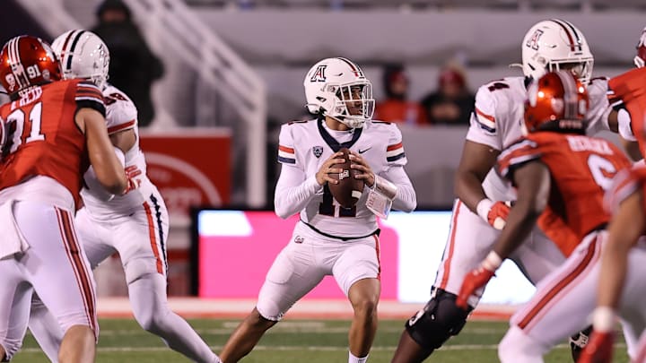 Nov 5, 2022; Salt Lake City, Utah, USA; Arizona Wildcats quarterback Noah Fifita (11) looks to pass the ball against the Utah Utes in the fourth quarter at Rice-Eccles Stadium.