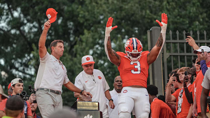 Clemson defensive end T.J. Parker (3) will forever have a strong connection to the Tigers and head coach Dabo Swinney. 