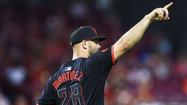 Jun 27, 2025; Cincinnati, Ohio, USA; Cincinnati Reds starting pitcher Nick Martinez (28) reacts after a play in the seventh inning against the San Diego Padres at Great American Ball Park. Mandatory Credit: Katie Stratman-Imagn Images