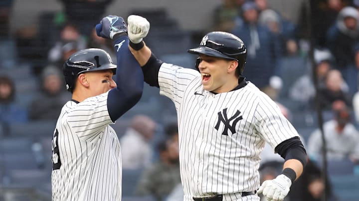 Apr 12, 2025; Bronx, New York, USA; New York Yankees first base Ben Rice (22) celebrates with outfielder Aaron Judge (99) after hitting a solo home run against the San Francisco Giants during the sixth inning at Yankee Stadium.