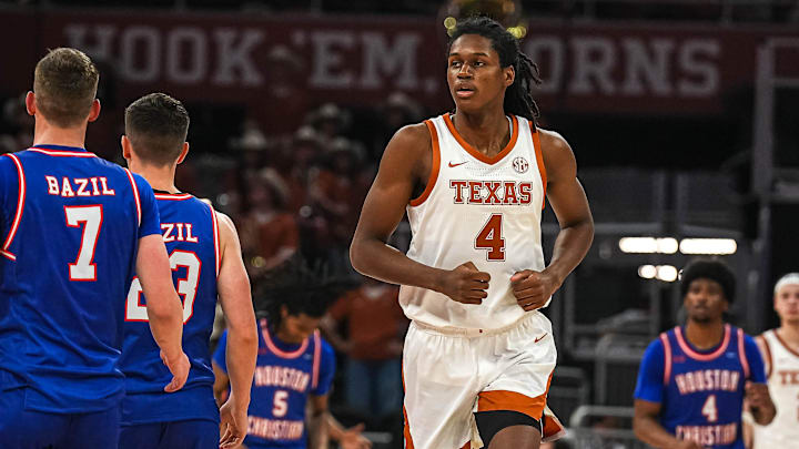 Texas Longhorns forward Jamie Vinson (4) runs towards his team basket during the game against Houston Christian at the Moody Center on Friday, Nov. 8, 2024 in Austin.