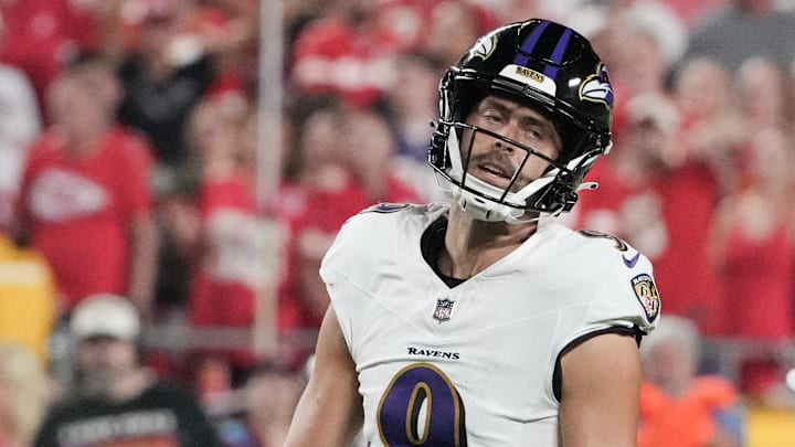 Sep 5, 2024; Kansas City, Missouri, USA; Baltimore Ravens kicker Justin Tucker (9) reacts after missing a field goal against the Kansas City Chiefs during the game at GEHA Field at Arrowhead Stadium.