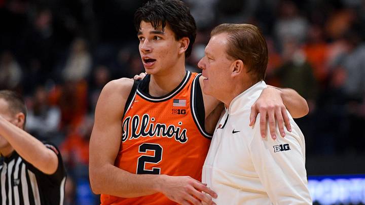 Dec 6, 2025; Nashville, Tennessee, USA; Illinois Fighting Illini guard Andrej Stojakovic (2) celebrates the win with head coach Brad Underwood against the Tennessee Volunteers during the second half at Bridgestone Arena. Mandatory Credit: Steve Roberts-Imagn Images Dec 6, 2025; Nashville, Tennessee, USA; Illinois Fighting Illini guard Andrej Stojakovic (2) celebrates the win with head coach Brad Underwood against the Tennessee Volunteers during the second half at Bridgestone Arena. Mandatory Credit: Steve Roberts-Imagn Images