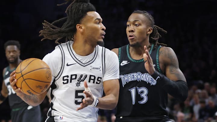 May 10, 2026; Minneapolis, Minnesota, USA; San Antonio Spurs guard Stephon Castle (5) works around Minnesota Timberwolves guard Ayo Dosunmu (13) in the first quarter of game four of the second round of the 2026 NBA Playoffs at Target Center. Mandatory Credit: Bruce Kluckhohn-Imagn Images May 10, 2026; Minneapolis, Minnesota, USA; San Antonio Spurs guard Stephon Castle (5) works around Minnesota Timberwolves guard Ayo Dosunmu (13) in the first quarter of game four of the second round of the 2026 NBA Playoffs at Target Center. Mandatory Credit: Bruce Kluckhohn-Imagn Images