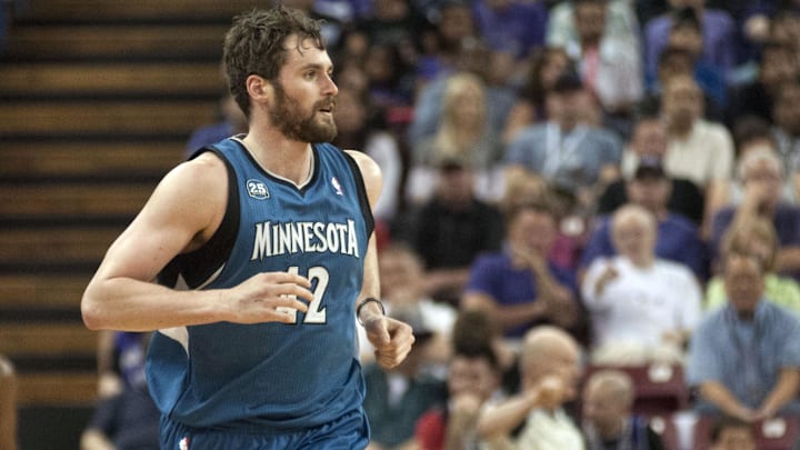 Minnesota Timberwolves forward Kevin Love runs up the court after scoring against the Sacramento Kings during the first quarter at Sleep Train Arena in Sacramento, Calif., on April 13, 2014.