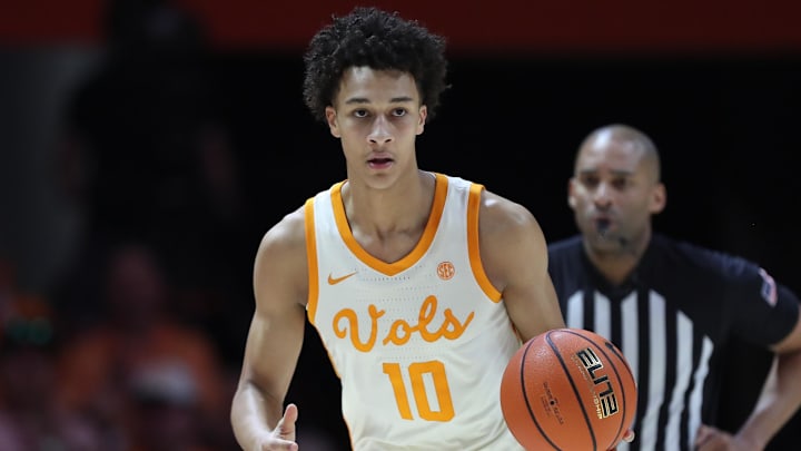 Feb 28, 2026; Knoxville, Tennessee, USA;  Tennessee Volunteers forward Nate Ament (10) brings the ball up court against the Alabama Crimson Tide.
