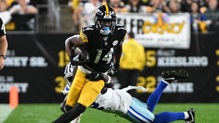 Oct 6, 2024; Pittsburgh, Pennsylvania, USA; Pittsburgh Steelers wide receiver George Pickens (14) breaks a tackle by Dallas Cowboys cornerback Jourdan Lewis (2) during the first quarter at Acrisure Stadium. Mandatory Credit: Barry Reeger-Imagn Images
Oct 6, 2024; Pittsburgh, Pennsylvania, USA; Pittsburgh Steelers wide receiver George Pickens (14) breaks a tackle by Dallas Cowboys cornerback Jourdan Lewis (2) during the first quarter at Acrisure Stadium. Mandatory Credit: Barry Reeger-Imagn Images