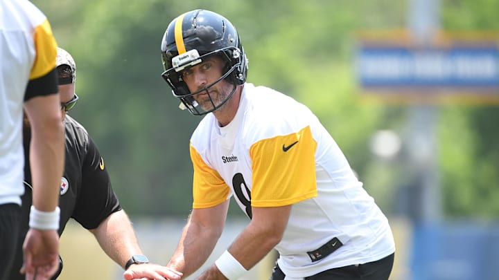 Jun 10, 2025; Pittsburgh, PA, USA;  Pittsburgh Steelers quarterback Aaron Rogers (8) takes a snap during minicamp at their South Side facility. Mandatory Credit: Philip G. Pavely-Imagn Images