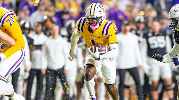 Aaron Anderson 1 runs the ball as the LSU Tigers take on the Vanderbilt Commodores. Nov 23, 2024; Baton Rouge, Louisiana, USA; at Tiger Stadium.