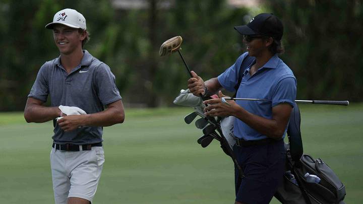 Charlie Woods, right, caddied for Miles Russell at the U.S. Open Final Qualifying event earlier this month. Charlie Woods, right, caddied for Miles Russell at the U.S. Open Final Qualifying event earlier this month.