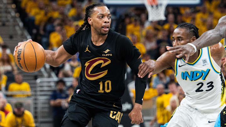 May 9, 2025; Indianapolis, Indiana, USA; Cleveland Cavaliers guard Darius Garland (10) dribbles the ball while Indiana Pacers forward Aaron Nesmith (23) defends during game three of the second round for the 2025 NBA Playoffs at Gainbridge Fieldhouse. Mandatory Credit: Trevor Ruszkowski-Imagn Images