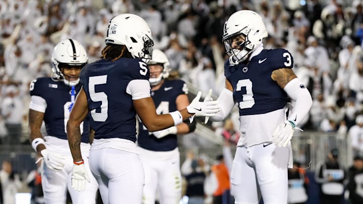 Penn State Nittany Lions wide receiver Julian Fleming (3) celebrates with wide receiver Omari Evans (5) after scoring a touchdown against the Washington Huskies.