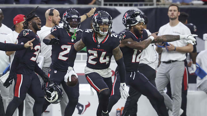 Dec 15, 2024; Houston, Texas, USA; Houston Texans cornerback Derek Stingley Jr. (24) reacts after an interception during the game against the Miami Dolphins at NRG Stadium. Mandatory Credit: Troy Taormina-Imagn Images