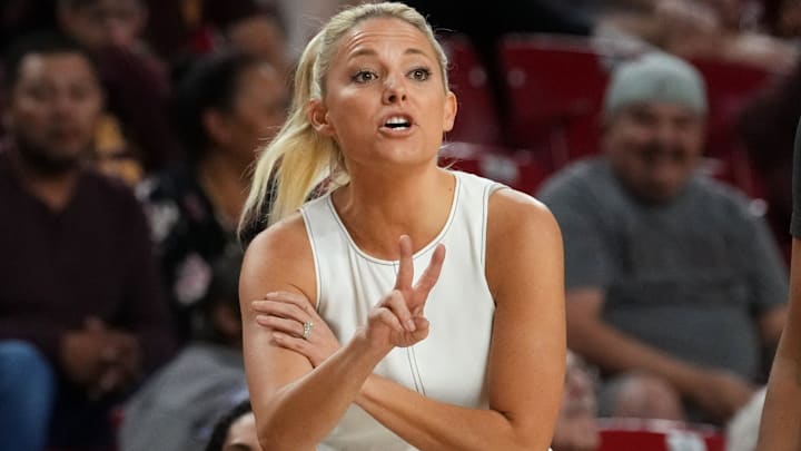 ASU Sun Devils head coach Molly Miller yells out to her team as they play the Coppin State Bald Eagles at Desert Financial Arena on Nov. 3, 2025. ASU Sun Devils head coach Molly Miller yells out to her team as they play the Coppin State Bald Eagles at Desert Financial Arena on Nov. 3, 2025.