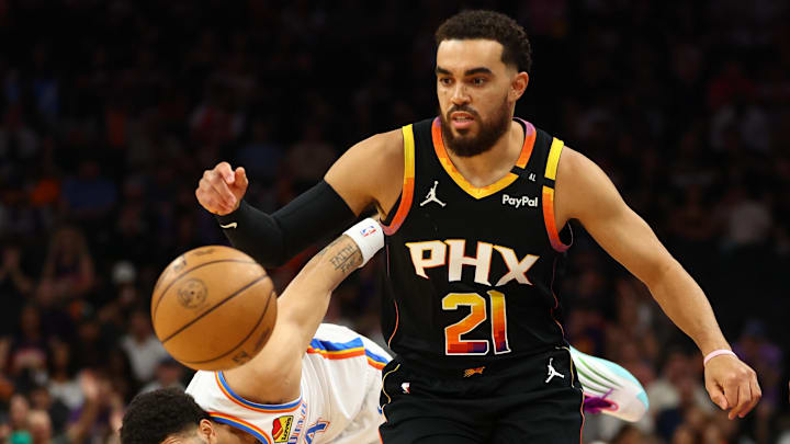 Apr 9, 2025; Phoenix, Arizona, USA; Phoenix Suns guard Tyus Jones (21) dribbles around Oklahoma City Thunder forward Adam Flagler (14) during the first half at Footprint Center. Mandatory Credit: Mark J. Rebilas-Imagn Images Apr 9, 2025; Phoenix, Arizona, USA; Phoenix Suns guard Tyus Jones (21) dribbles around Oklahoma City Thunder forward Adam Flagler (14) during the first half at Footprint Center. Mandatory Credit: Mark J. Rebilas-Imagn Images