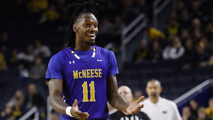 Dec 29, 2023; Ann Arbor, Michigan, USA;  McNeese State Cowboys forward CJ Felder (11) celebrate