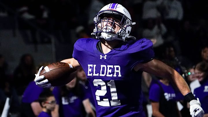 Elder Panthers running back Tommy Becker (21) celebrates after scoring a touchdown in the first half of a high school football game between the Elder Panthers and Highlands Bluebirds, Friday, Oct. 10, 2025, at The Pit in Cincinnati.