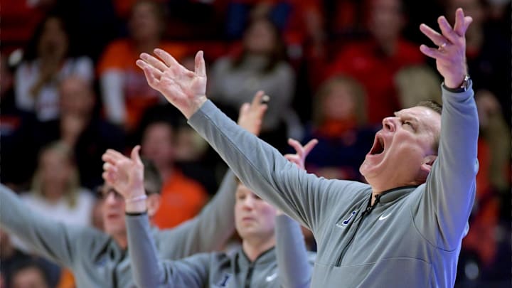 Mar 7, 2025; Champaign, Illinois, USA;  Illinois Fighting Illini head coach Brad Underwood reacts to a call with his assistants during the second half against the Purdue Boilermakers at State Farm Center. Mandatory Credit: Ron Johnson-Imagn Images