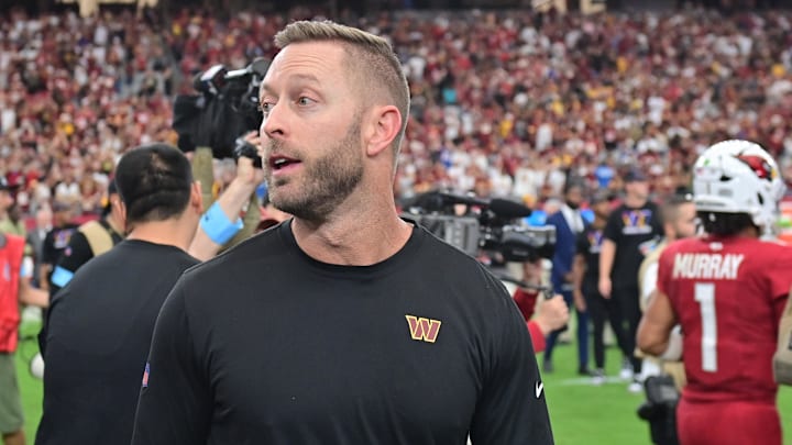 Sep 29, 2024; Glendale, Arizona, USA;  Washington Commanders offensive coordinator Kliff Kingsbury reacts after beating the Arizona Cardinals at State Farm Stadium. 