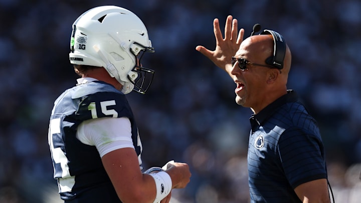 Aug 30, 2025; University Park, Pennsylvania, USA; Penn State Nittany Lions head coach James Franklin talks with quarterback Drew Allar (15) during the first quarter against the Nevada Wolf Pack at Beaver Stadium. Mandatory Credit: Matthew O'Haren-Imagn Images