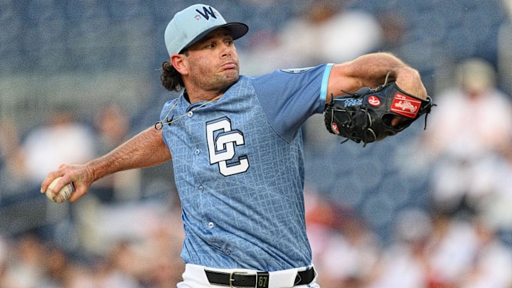 Apr 5, 2025; Washington, District of Columbia, USA; Washington Nationals pitcher Kyle Finnegan (67) throws a pitch during the ninth inning against the Arizona Diamondbacks at Nationals Park.