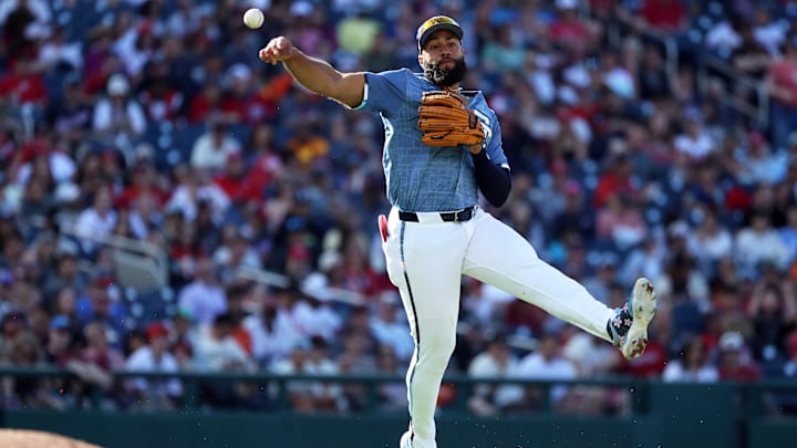 May 24, 2025; Washington, District of Columbia, USA; Washington Nationals third baseman Amed Rosario (13) throws to first for an out during the sixth inning against the San Francisco Giants at Nationals Park. 