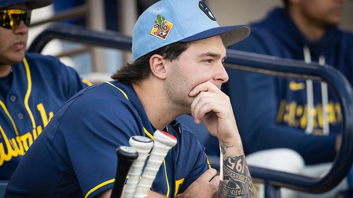 Milwaukee Brewers infield prospect Andrew Fischer watches the major leaguers practice during spring training workouts Tuesday, February 17, 2026, at American Family Fields of Phoenix in Phoenix, Arizona. Milwaukee Brewers infield prospect Andrew Fischer watches the major leaguers practice during spring training workouts Tuesday, February 17, 2026, at American Family Fields of Phoenix in Phoenix, Arizona.