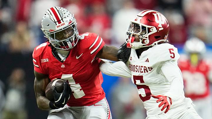 Ohio State Buckeyes wide receiver Jeremiah Smith (4) shakes off Indiana Hoosiers defensive back D'Angelo Ponds (5) during the Big Ten Conference championship game at Lucas Oil Stadium in Indianapolis on Dec. 6, 2025. Ohio State lost 13-10. Ohio State Buckeyes wide receiver Jeremiah Smith (4) shakes off Indiana Hoosiers defensive back D'Angelo Ponds (5) during the Big Ten Conference championship game at Lucas Oil Stadium in Indianapolis on Dec. 6, 2025. Ohio State lost 13-10.