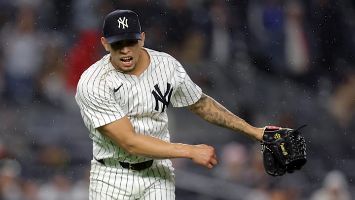 Jun 16, 2025; Bronx, New York, USA; New York Yankees relief pitcher Jonathan Loaisiga (43) reacts after giving up the go ahead run during the eleventh inning against the Los Angeles Angels at Yankee Stadium. Mandatory Credit: Brad Penner-Imagn Images