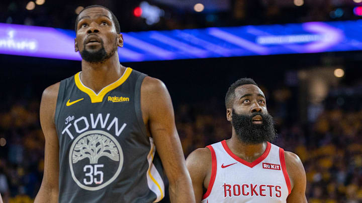 April 30, 2019; Oakland, CA, USA; Golden State Warriors forward Kevin Durant (35) and Houston Rockets guard James Harden (13) during the third quarter in game two of the second round of the 2019 NBA Playoffs at Oracle Arena. The Warriors defeated the Rockets 115-109. Mandatory Credit: Kyle Terada-Imagn Images
