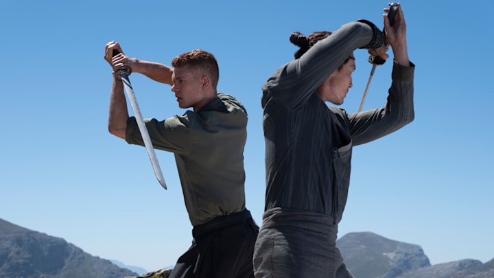 Rand (Josha Stradowski) and Lan (Daniel Henney) in The Wheel of Time season 3. Image: Prime Video.