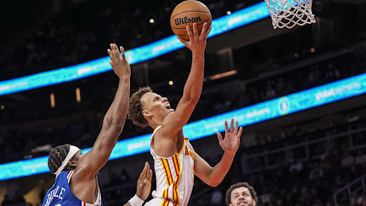 Mar 10, 2025; Atlanta, Georgia, USA; Atlanta Hawks guard Dyson Daniels (5) goes to the basket past Philadelphia 76ers forward Guerschon Yabusele (28) during the second half at State Farm Arena. Mandatory Credit: Dale Zanine-Imagn Images Mar 10, 2025; Atlanta, Georgia, USA; Atlanta Hawks guard Dyson Daniels (5) goes to the basket past Philadelphia 76ers forward Guerschon Yabusele (28) during the second half at State Farm Arena. Mandatory Credit: Dale Zanine-Imagn Images