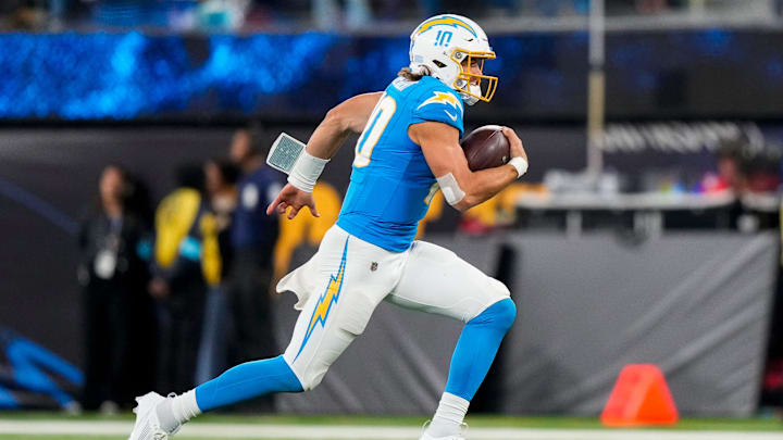 Los Angeles Chargers quarterback Justin Herbert (10) breaks away on a QB sneak in the second quarter of the NFL Week 11 game between the Los Angeles Chargers and the Cincinnati Bengals at SoFi Stadium in Inglewood, Calif., on Sunday, Nov. 17, 2024. The Chargers led 24-6 at halftime.