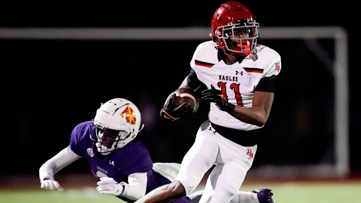 Brentwood Academy's Kesean Bowman (11) escapes from Father Ryan's Mason Bryant (3) during the second quarter at Father Ryan High School in Nashville, Tenn., Friday, Nov. 15, 2024. Brentwood Academy's Kesean Bowman (11) escapes from Father Ryan's Mason Bryant (3) during the second quarter at Father Ryan High School in Nashville, Tenn., Friday, Nov. 15, 2024.