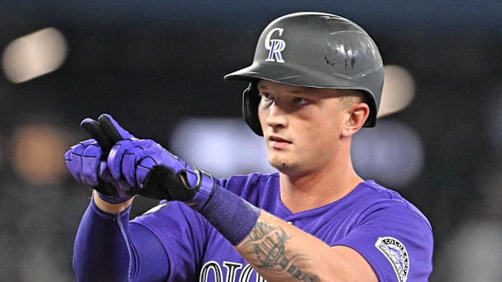 Mar 31, 2026; Toronto, Ontario, CAN; Colorado Rockies designated hitter TJ Rumfield (7) reacts after hitting a single against the Toronto Blue Jays in the seventh inning at Rogers Centre.