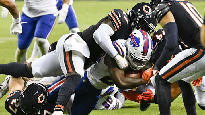 Aug 17, 2025; Chicago, Illinois, USA;  Buffalo Bills cornerback Brandon Codrington (29) runs the ball against Chicago Bears linebacker Ruben Hyppolite II (47) during the second half at Soldier Field. Mandatory Credit: Matt Marton-Imagn Images