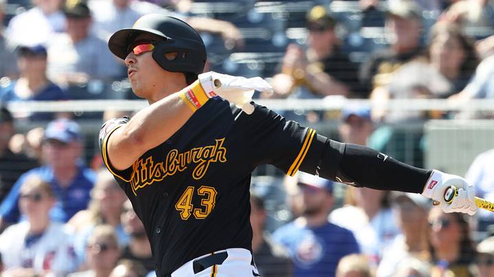 Sep 17, 2025; Pittsburgh, Pennsylvania, USA;  Pittsburgh Pirates first baseman Rafael Flores (43) hits a double for his first major league hit in his major league debut against the Chicago Cubs during the third inning at PNC Park. Mandatory Credit: Charles LeClaire-Imagn Images