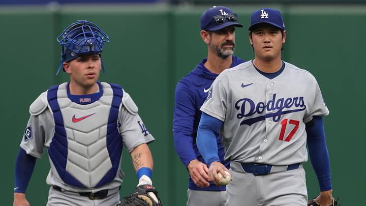 Jun 10, 2026; Pittsburgh, Pennsylvania, USA;  Los Angeles Dodgers catcher Dalton Rushing (68) and two-way player Shohei Ohtani (17) make thier way in from the bullpen to play the Pittsburgh Pirates at PNC Park. Mandatory Credit: Charles LeClaire-Imagn Images
