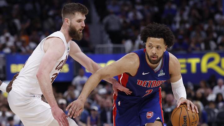 May 17, 2026; Detroit, Michigan, USA; Detroit Pistons guard Cade Cunningham (2) dribbles against Cleveland Cavaliers forward/center Dean Wade (32) in the second half during game seven of the second round of the 2026 NBA Playoffs at Little Caesars Arena. Mandatory Credit: Rick Osentoski-Imagn Images