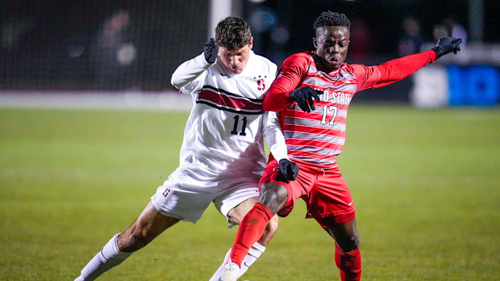 Ohio State Buckeyes midfielder Michael Adedokun (17) fights for the ball against Stanford forward Alfonso Tenconi-Gradillas (11) in the first half of the third round of the NCAA tournament at Jesse Owens Memorial Stadium on Sunday, Dec. 1, 2024 in Columbus, OH.