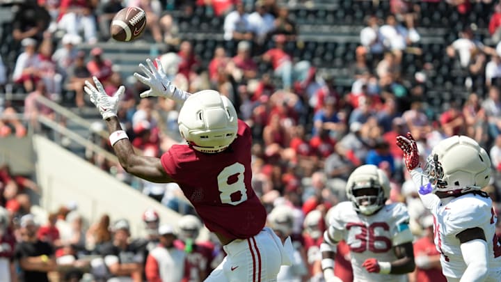 April 11, 2026; Tuscaloosa, AL, USA; Alabama Crimson Tide wide receiver Cederian Morgan (8) catches a deep pass from Alabama Crimson Tide quarterback Keelon Russell (12) at Bryant-Denny Stadium during the Alabama A Day scrimmage. April 11, 2026; Tuscaloosa, AL, USA; Alabama Crimson Tide wide receiver Cederian Morgan (8) catches a deep pass from Alabama Crimson Tide quarterback Keelon Russell (12) at Bryant-Denny Stadium during the Alabama A Day scrimmage.