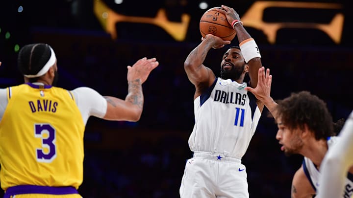 Nov 22, 2023; Los Angeles, California, USA; Dallas Mavericks guard Kyrie Irving (11) shoots against