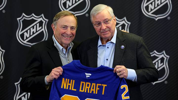 Jan 12, 2026; Buffalo, New York, USA;  NHL Commissioner Gary Bettman and Buffalo Sabres owner Terry Pegula pose for a photo during a press conference announcing the 2026 NHL Draft taking place in Buffalo at KeyBank Center. Mandatory Credit: Timothy T. Ludwig-Imagn Images