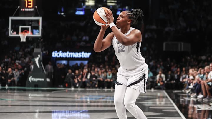 Oct 1, 2024; Brooklyn, New York, USA; Las Vegas Aces guard Chelsea Gray (12) during game two of the 2024 WNBA Semi-finals at Barclays Center. Mandatory Credit: Wendell Cruz-Imagn Images