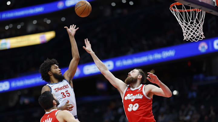 Dec 8, 2024; Washington, District of Columbia, USA; Washington Wizards forward Marvin Bagley III (35) shoots the ball as Memphis Grizzlies center Jay Huff (30) defends in the second quarter at Capital One Arena. Mandatory Credit: Geoff Burke-Imagn Images Dec 8, 2024; Washington, District of Columbia, USA; Washington Wizards forward Marvin Bagley III (35) shoots the ball as Memphis Grizzlies center Jay Huff (30) defends in the second quarter at Capital One Arena. Mandatory Credit: Geoff Burke-Imagn Images